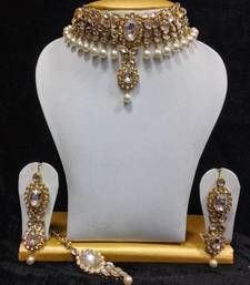 Buy Close Neck Style Kundan Jewelry in White with Pearls necklace-set online 